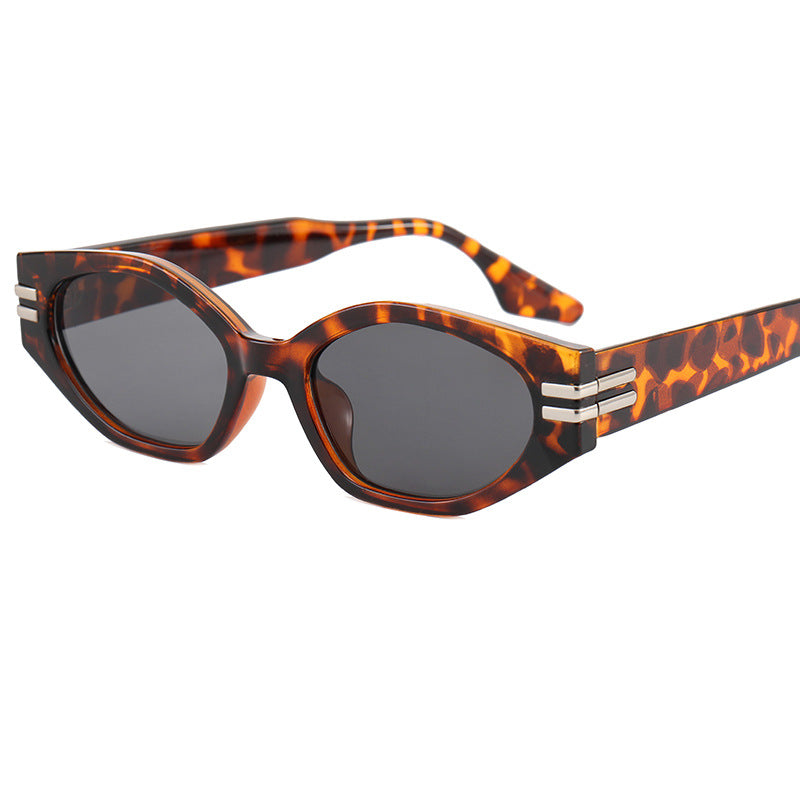 Women striking vintage sunglasses with asymmetric frame Stornfield