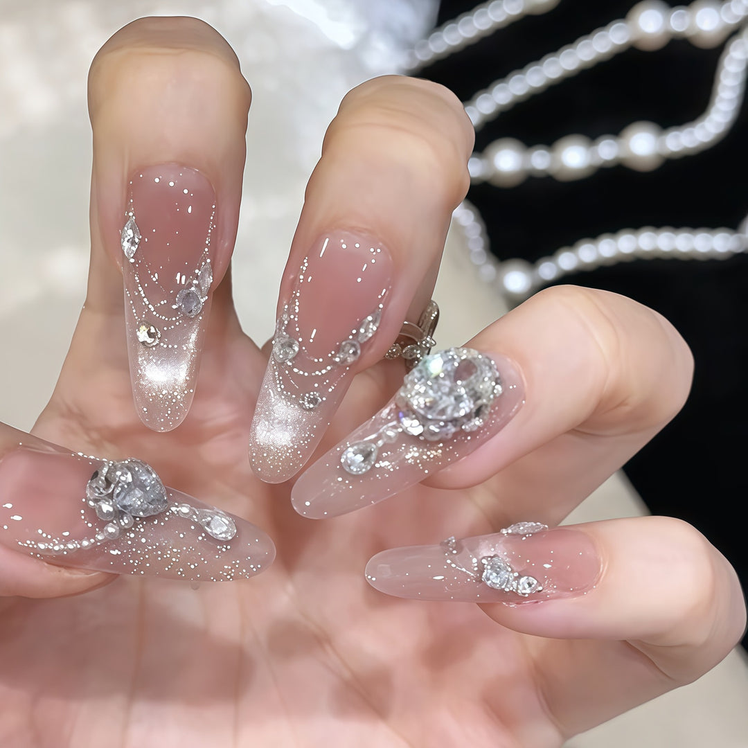 Glamorous artificial nail tips with rhinestone accents Stornfield