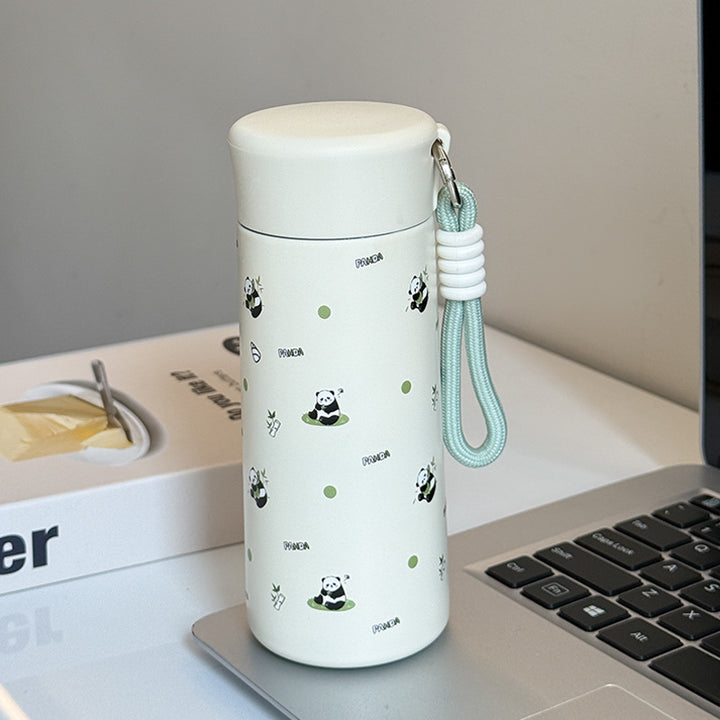Women’s insulated drinking bottle with practical carrying strap and playful design Stornfield