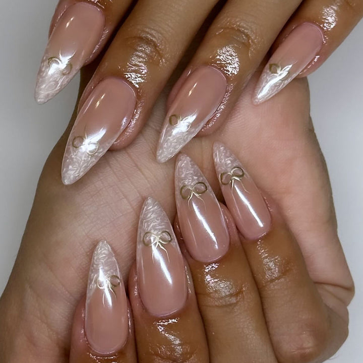 Artful stiletto nails with elegant design and radiant accents Stornfield