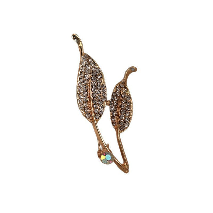 Elegant brooch with leaf shape and crystals Stornfield