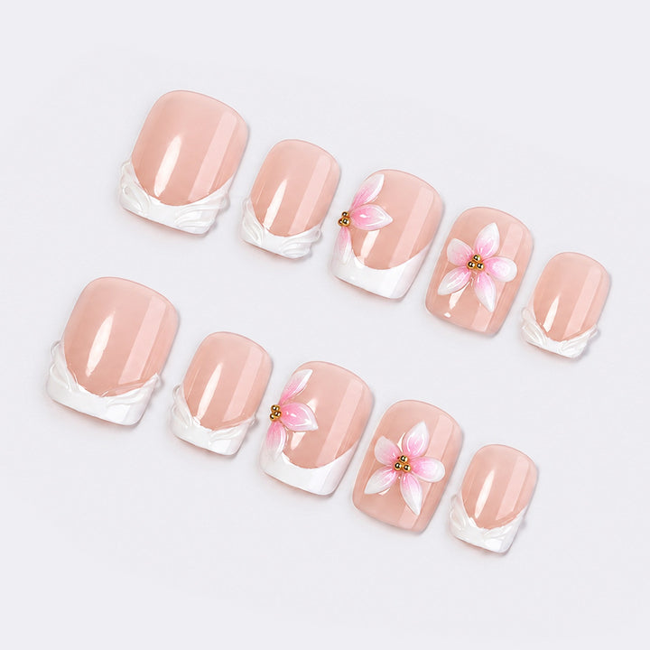 Artificial nail set with delicate floral designs Stornfield