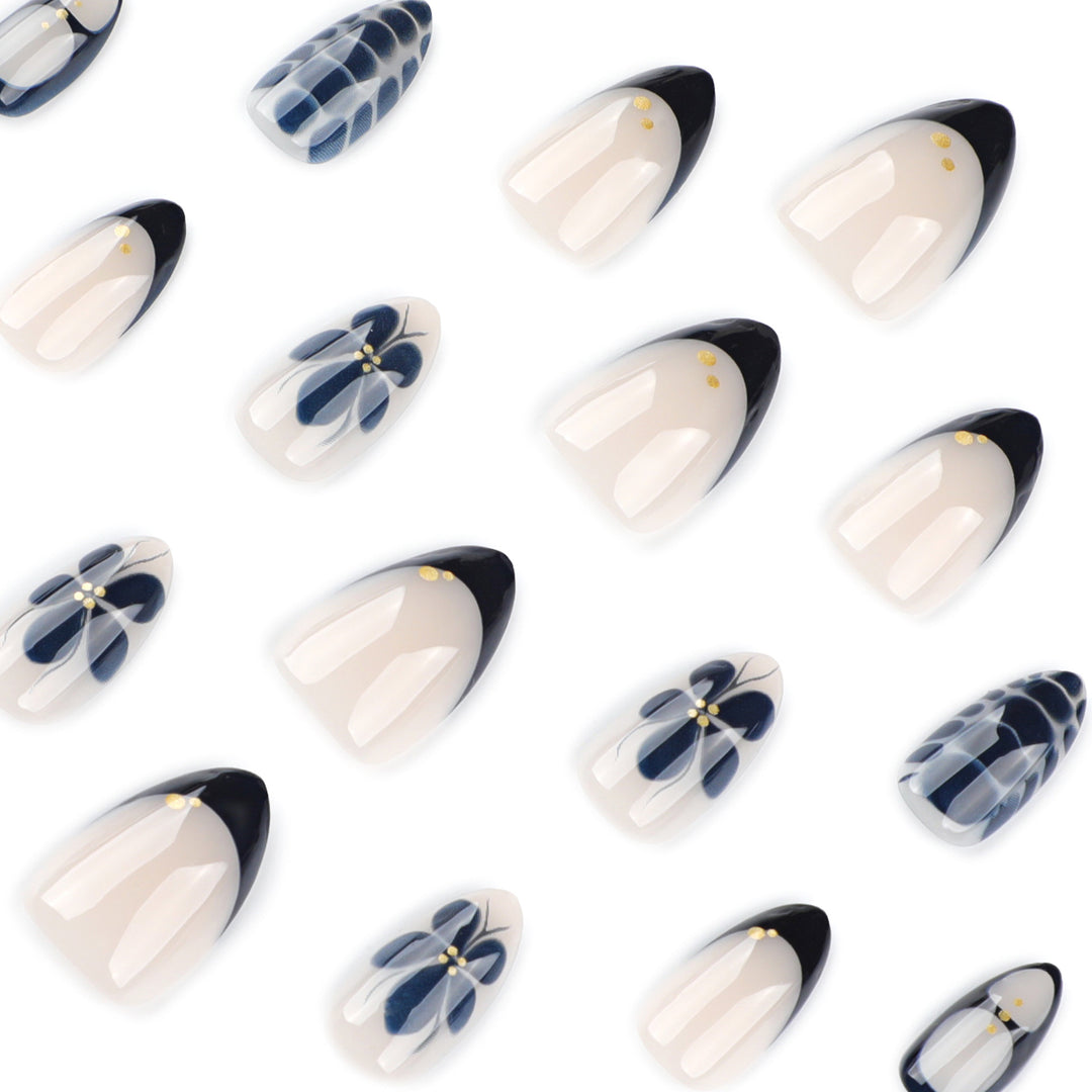 Artful nail art in elegant stiletto design with floral accents Stornfield