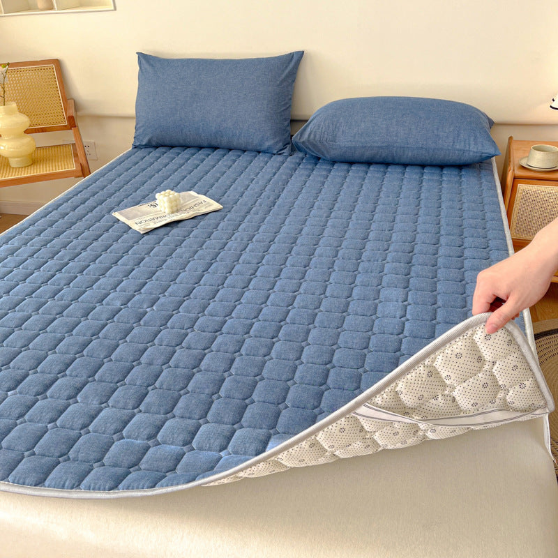 Padded mattress protector-topper with quilting and non-slip underside