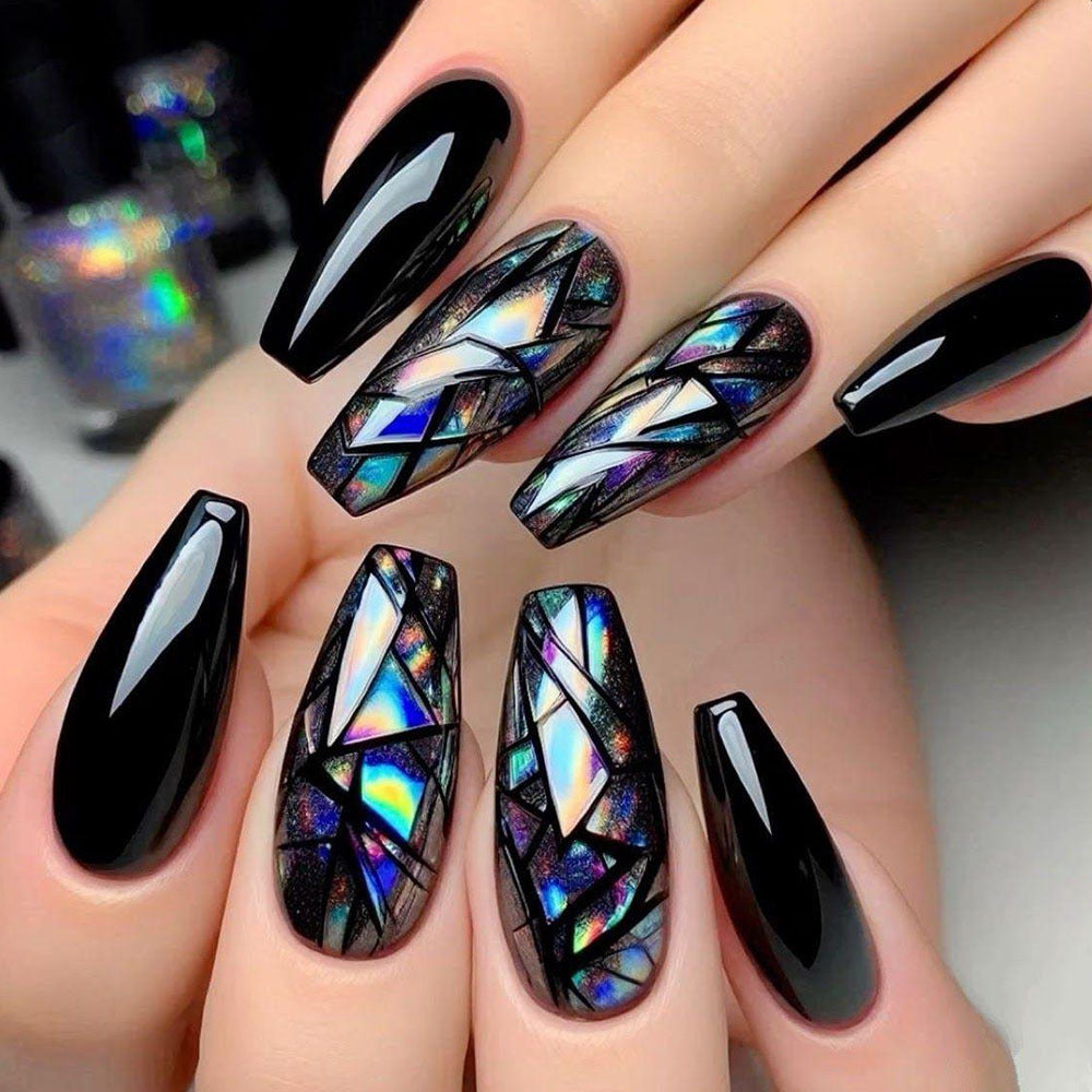 Trendy artificial nails with holographic geometric patterns Stornfield