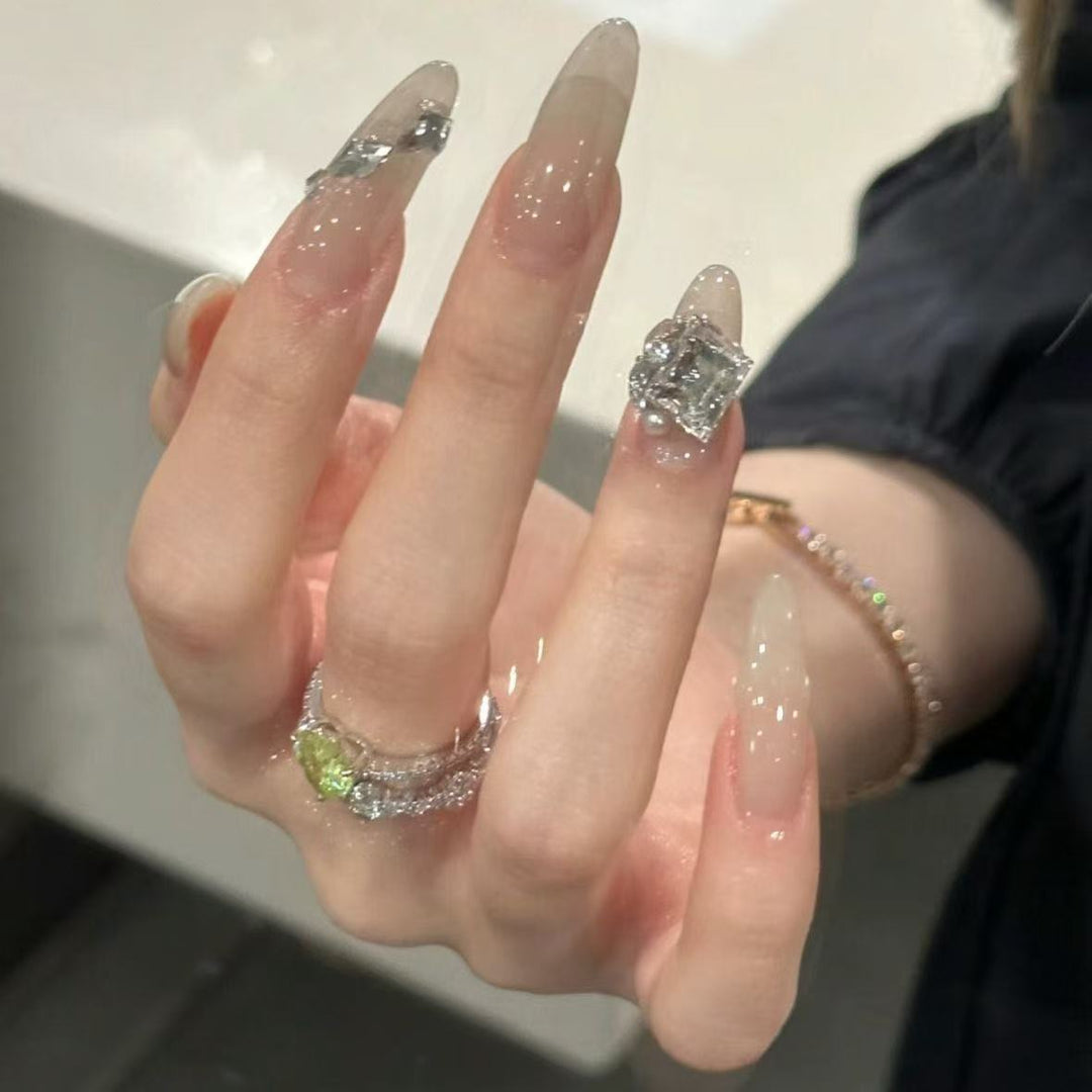 Elegant Stiletto Nail Extensions with Rhinestone Accents Stornfield
