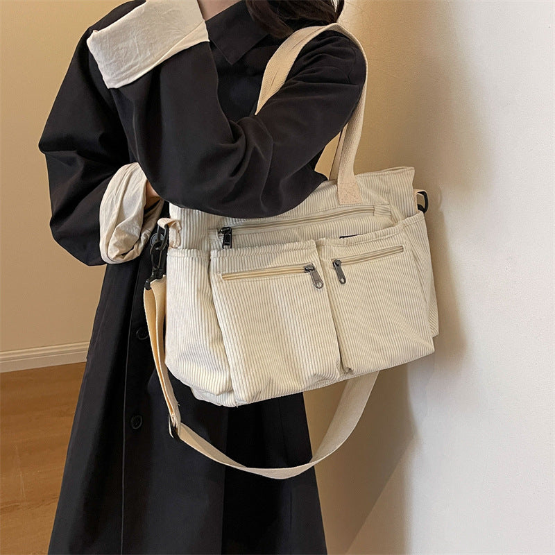 Durable shoulder bag with multiple compartments Stornfield
