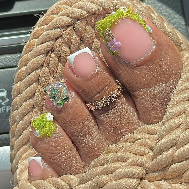 Creative nail set with glitter and flower designs Stornfield