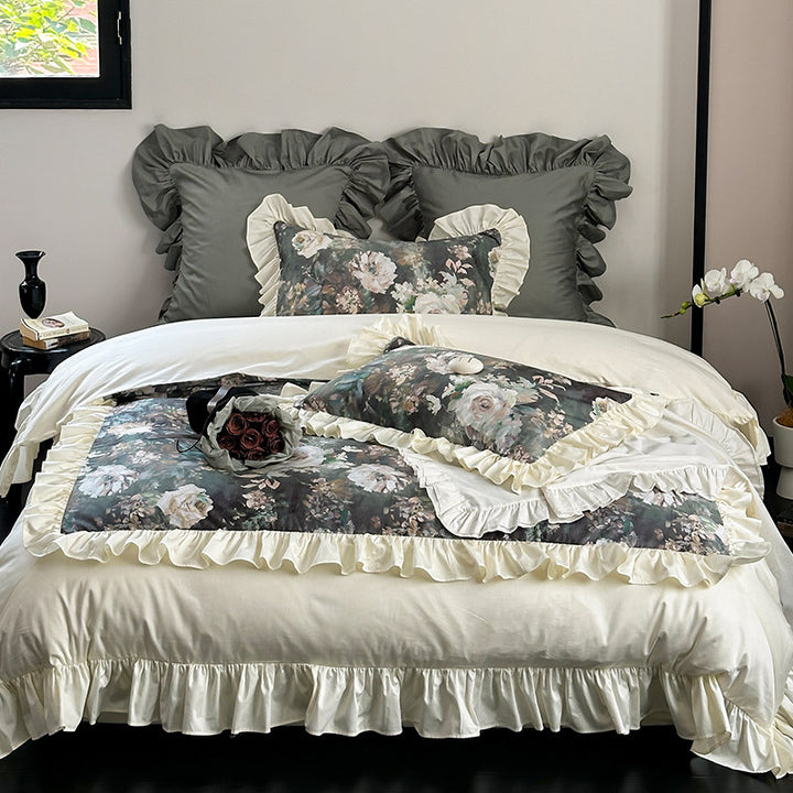 Luxurious bedding set with floral pattern, ruffles and satin finish