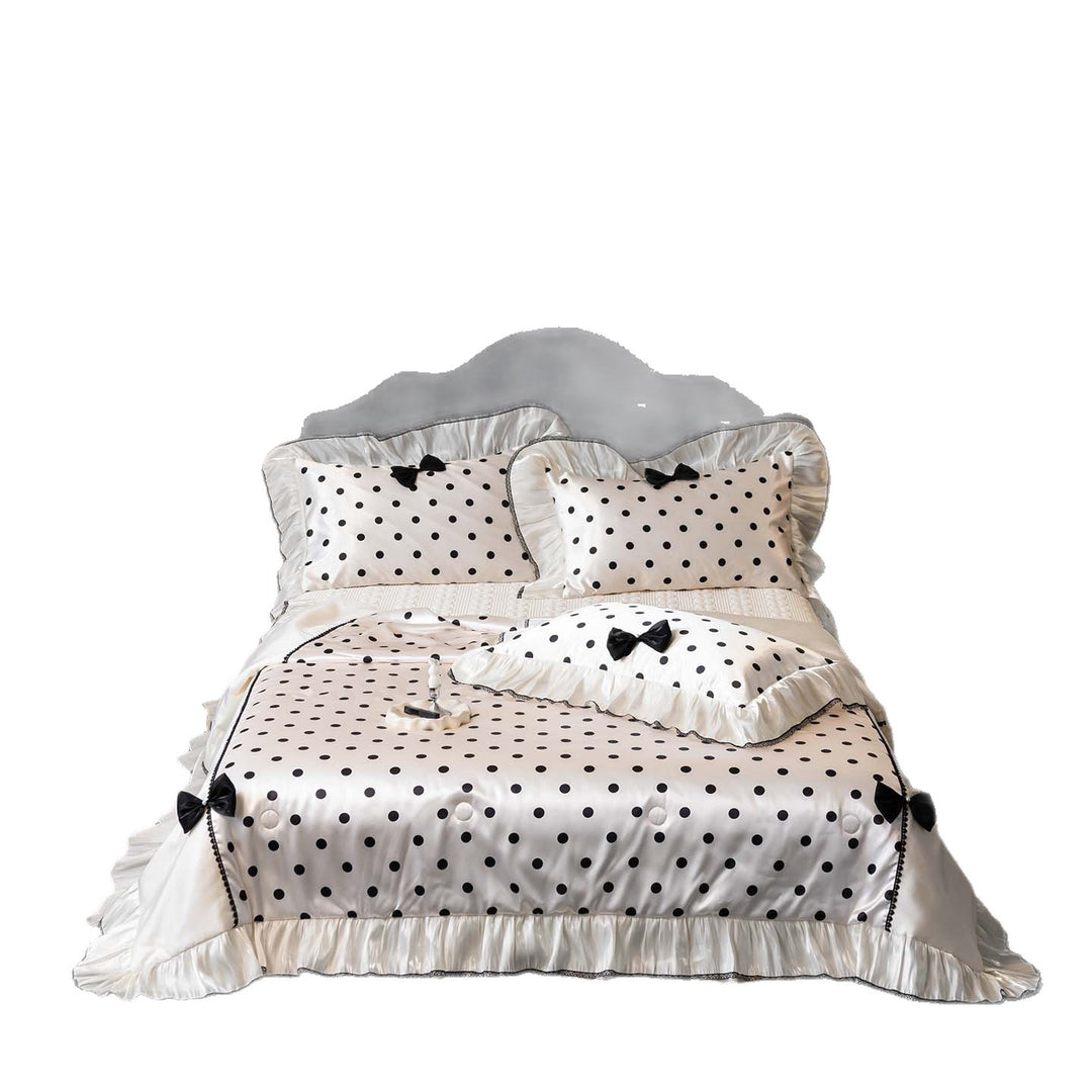 Romantic polka dot satin bedding set with ruffles and decorative ribbons