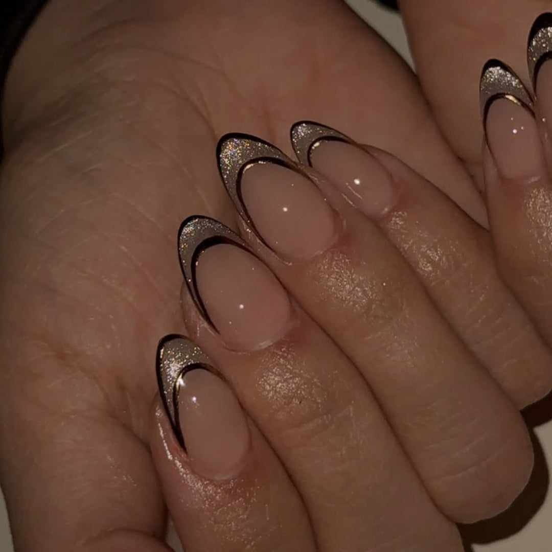 Elegant Gel Nails with Glitter and French Tip Decoration Stornfield