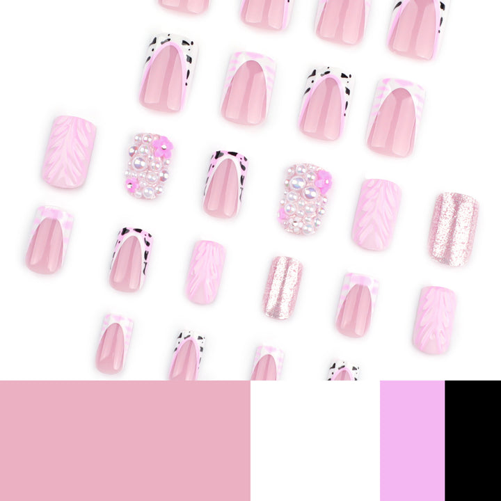 Artful nail extensions with mother-of-pearl effects and delicate design Stornfield