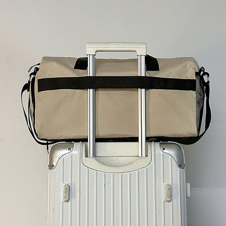 Sporty travel bag with reinforced carrying system and secure interior Stornfield