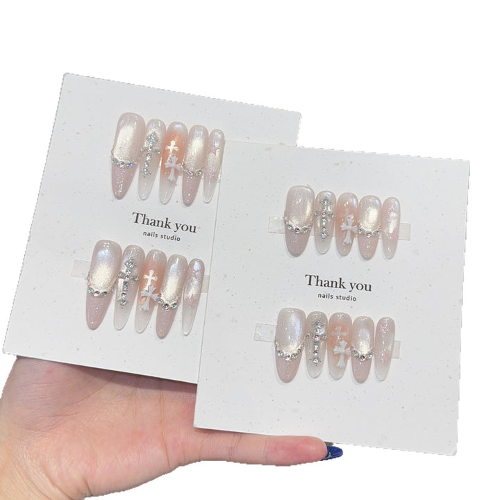 Artificial nails with sparkling rhinestone and glitter effects Stornfield