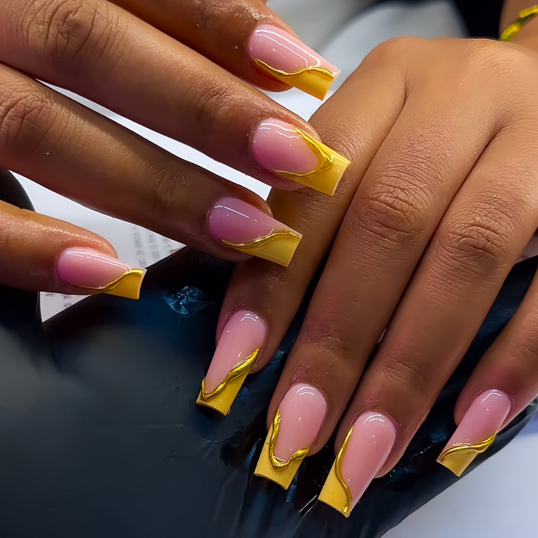 Elegant Acrylic French Tip Press-On Nails with Gold Detailing Stornfield