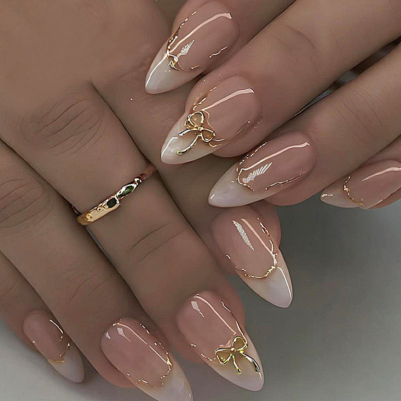 Acrylic Nail Set with Elegant Bows and Glamorous Accent Stornfield