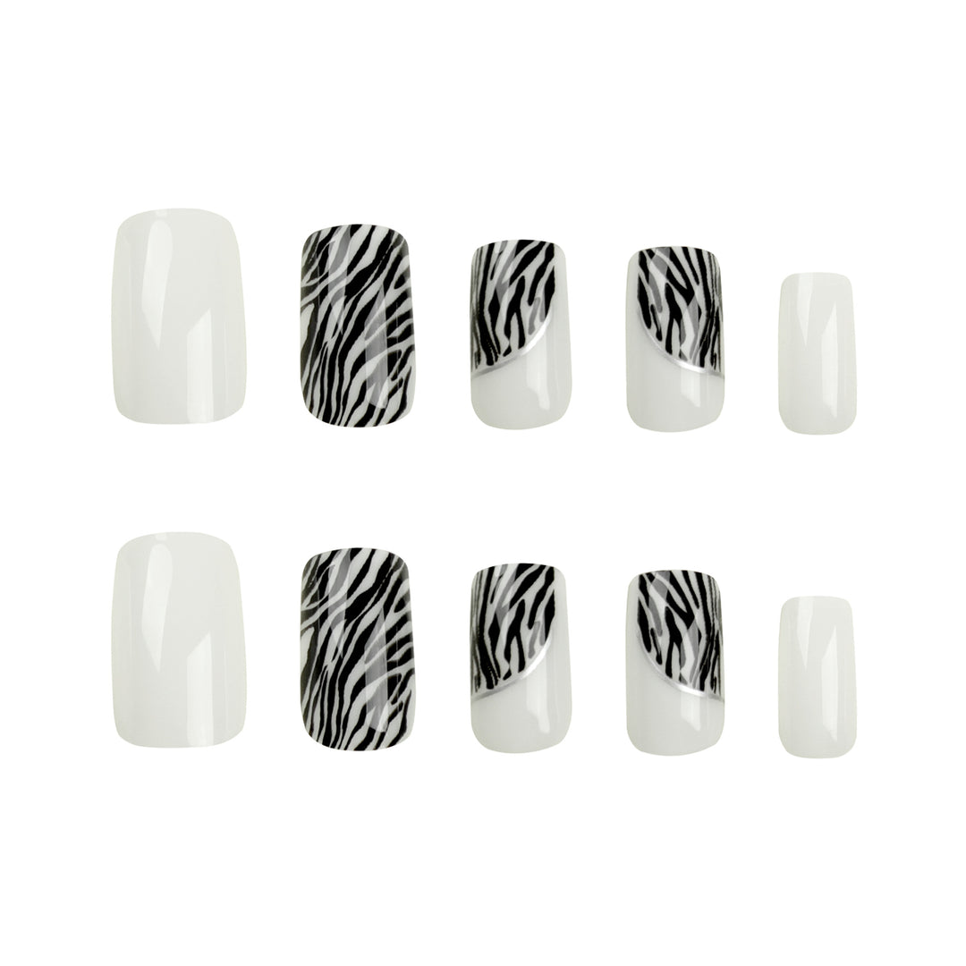 Artful nail extensions with stylish zebra pattern Stornfield