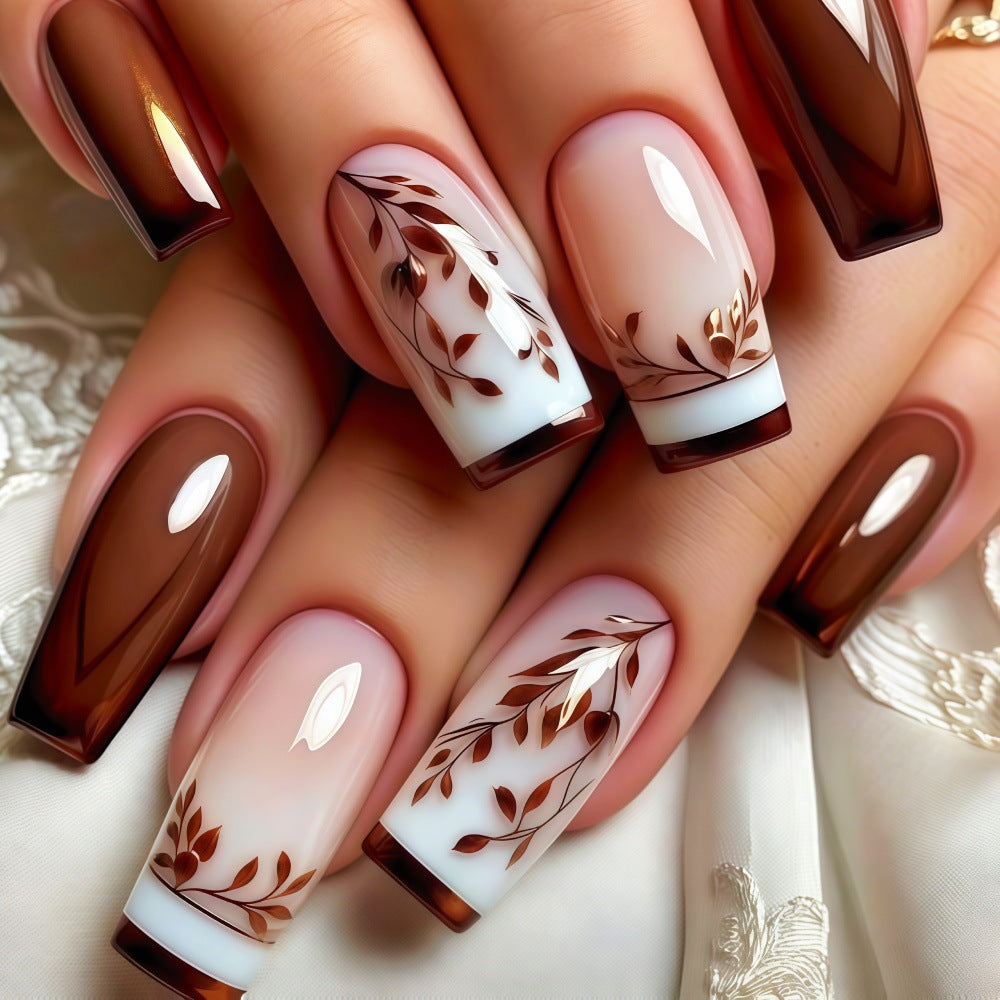Elegant Artificial Nails with Filigree Leaf Patterns Stornfield