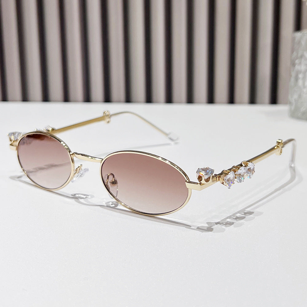 Fashion-Forward Oval Sunglasses with Crystal Accents Stornfield