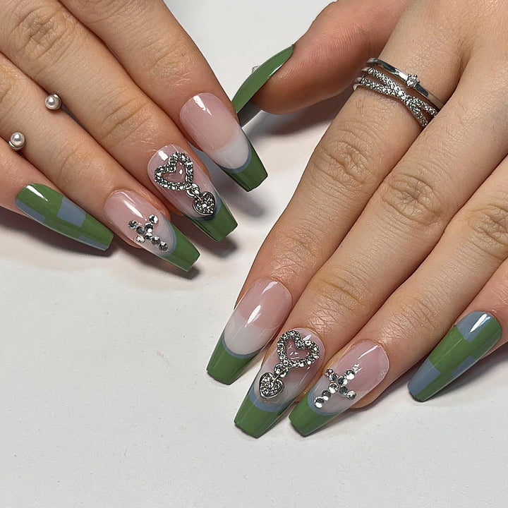 Artistic nail extensions with decorative jewelry effect Stornfield