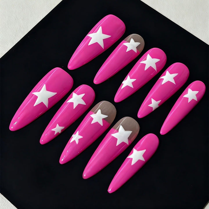 Artificial nails in elegant pointed design with star motifs Stornfield