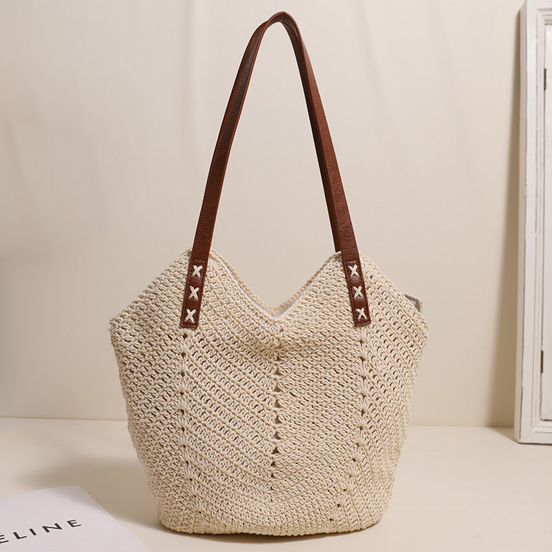 Handcrafted wicker bag with sturdy leather handles Stornfield