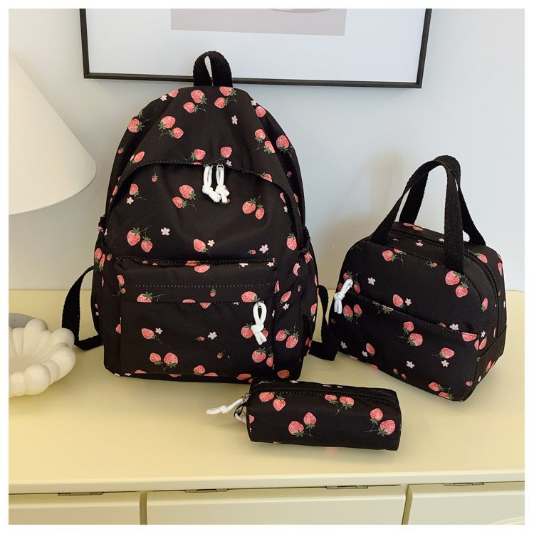 Backpack set with cheerful strawberry pattern and practical compartments Stornfield