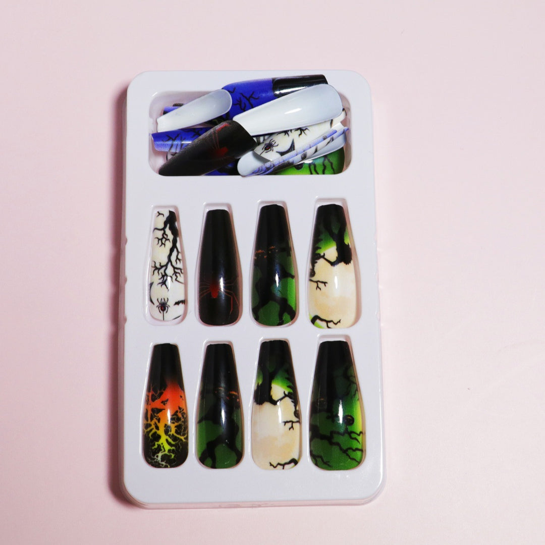 Artistic Press-On Nail Design with Dripping Effect Stornfield