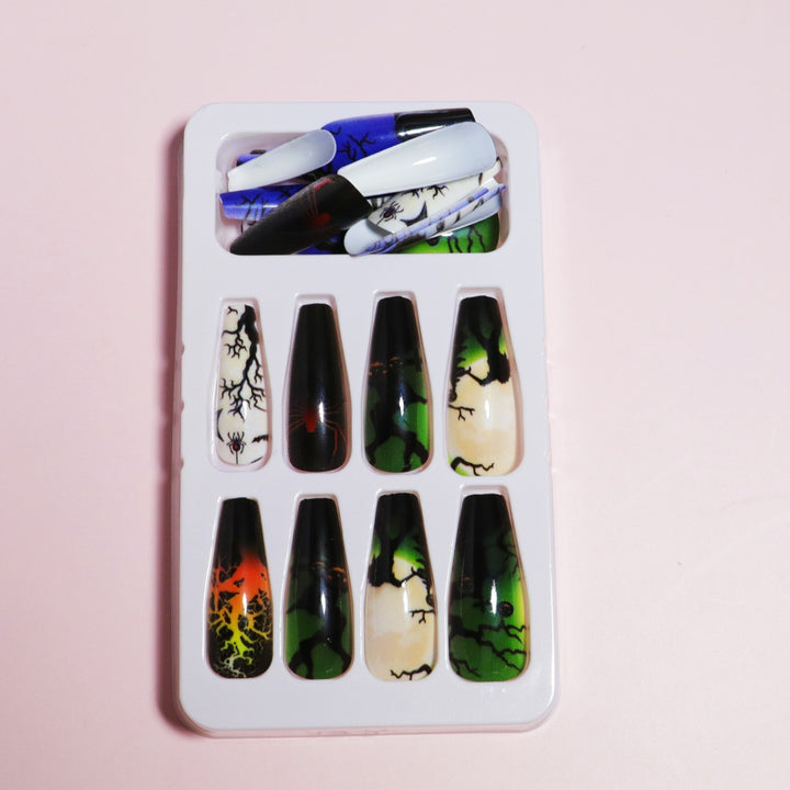 Artistic Press-On Nail Design with Dripping Effect Stornfield