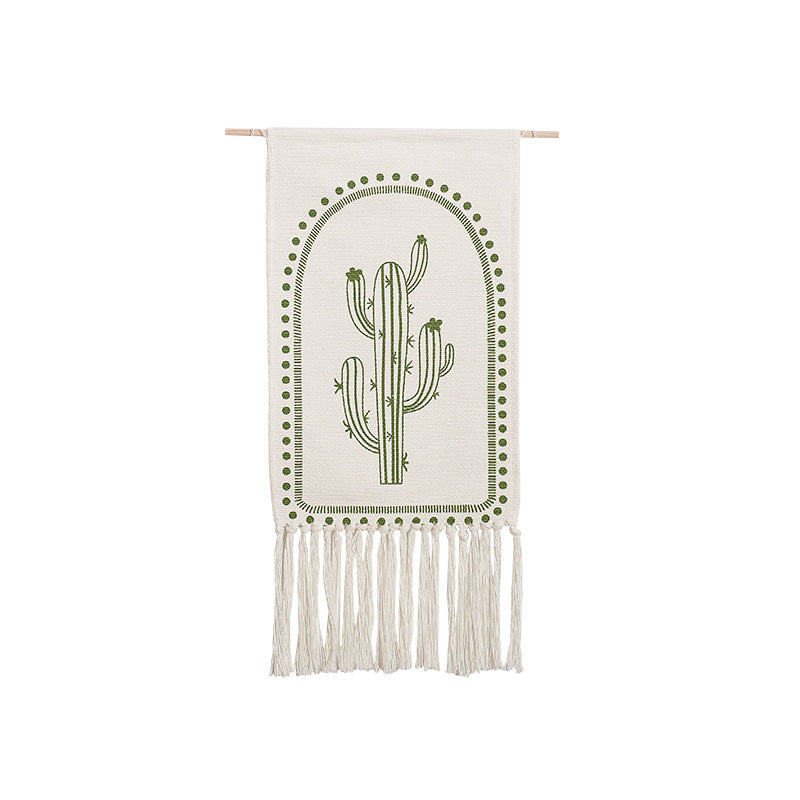 Woven wall hanging with hand-drawn mushroom motif and long cotton fringes Stornfield