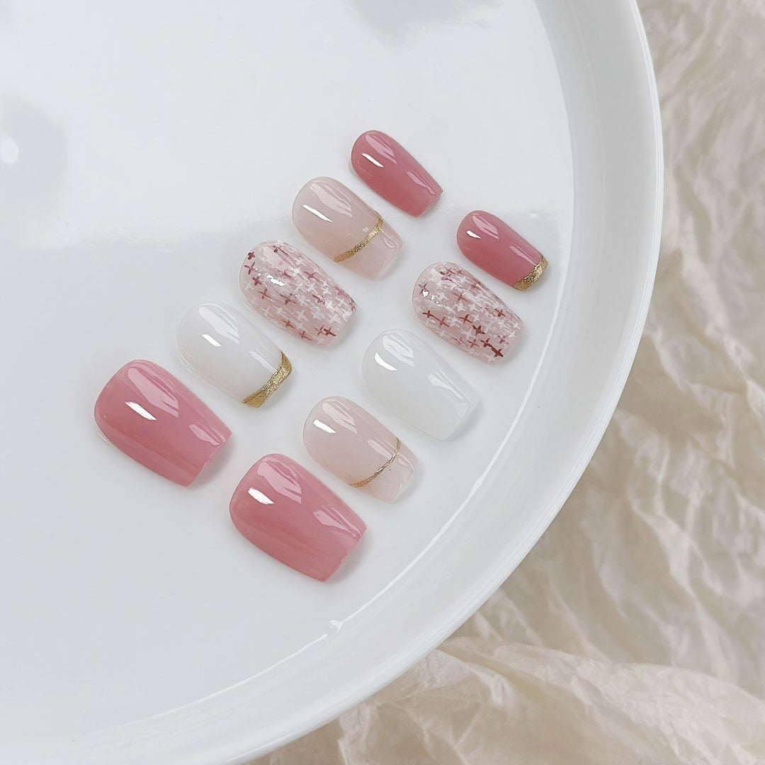 Elegant Press-On Nail Art Set with Gold and Pink Accents