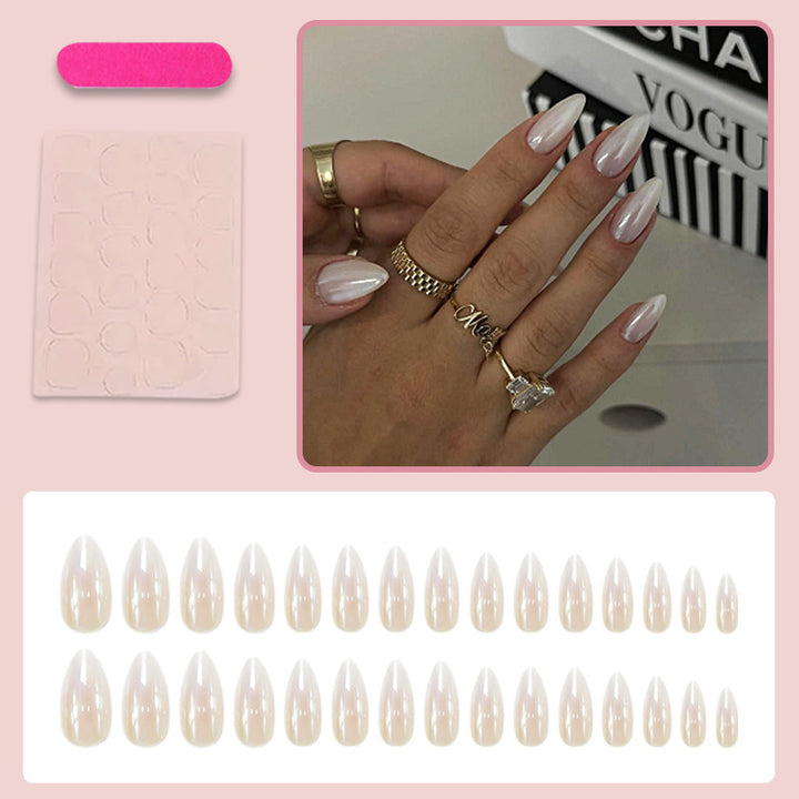 Acrylic nail set with elegant pointed shapes and glossy accents Stornfield
