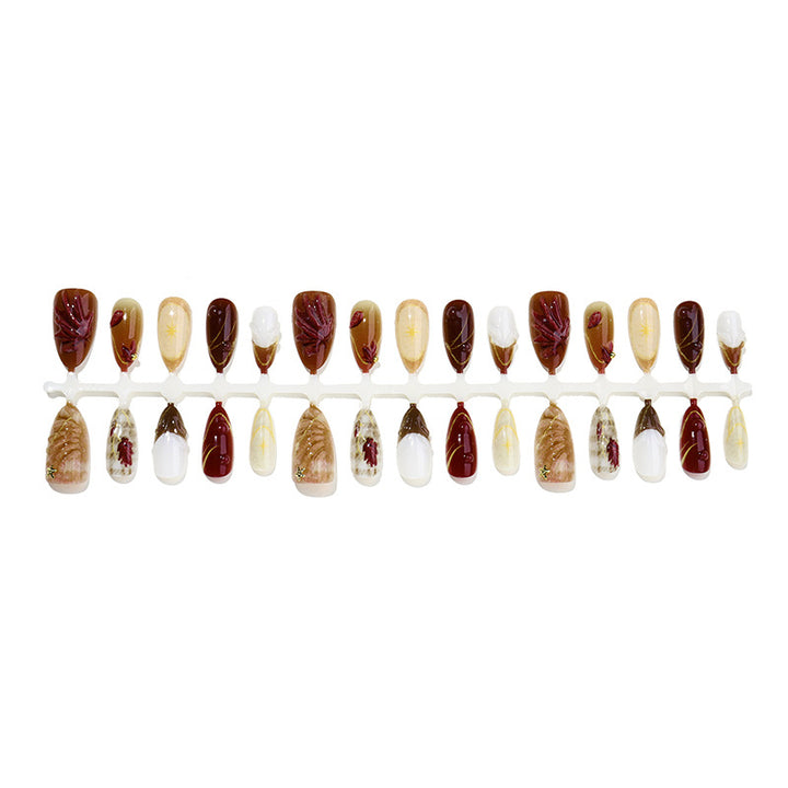 Nail set with elegant flower and glitter accents Stornfield