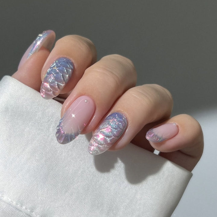 Artful nail extensions with shimmering play of colors and glamorous accents Stornfield