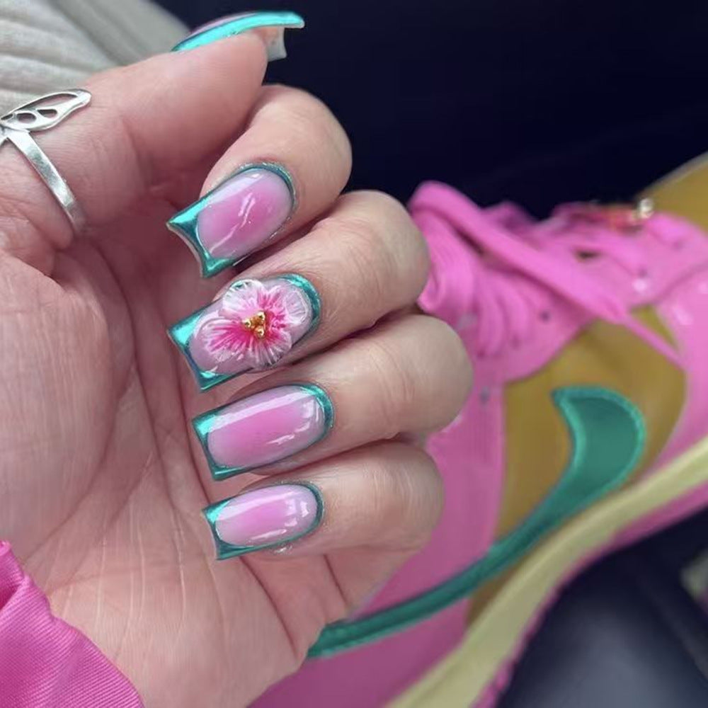 Creative nail art with floral applications Stornfield