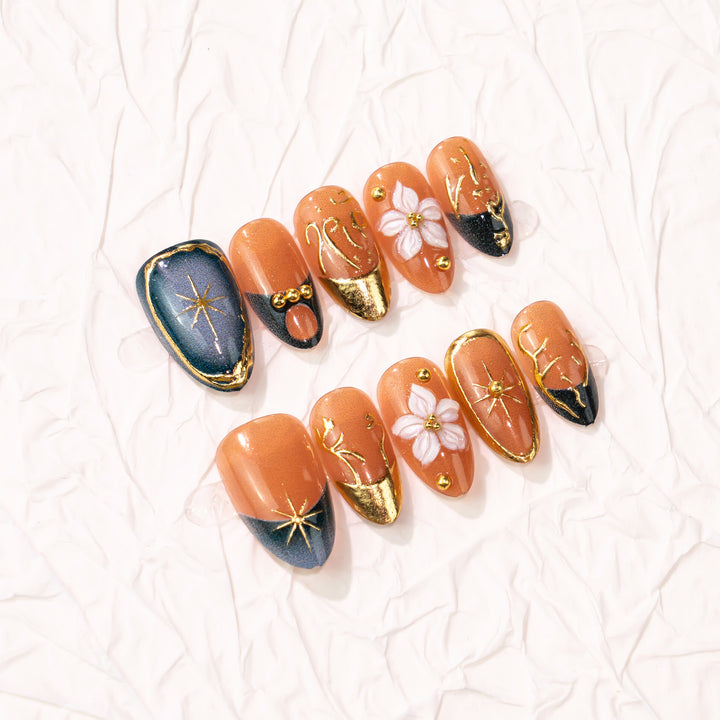 Artistic Floral Press-On Nail Art with Gold Accents Stornfield