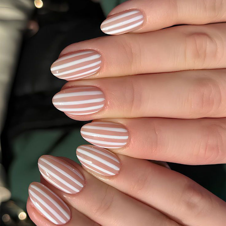 Stylish nail art with elegant stripe patterns Stornfield