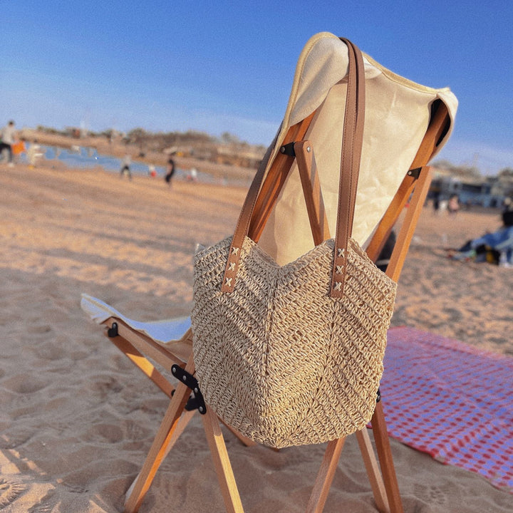 Casual bag made of handwoven straw with wide leather handles Stornfield