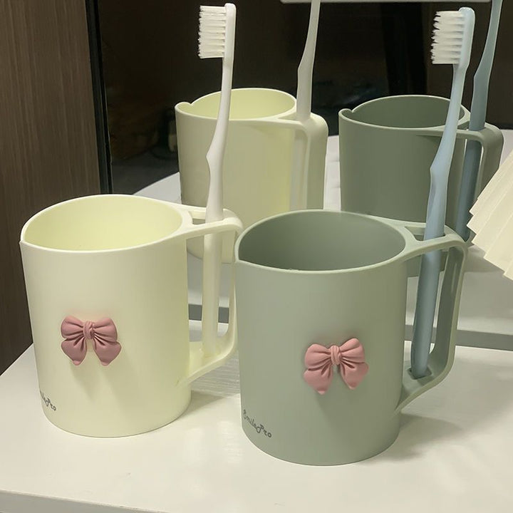 Ceramic mug with elegant bow motif Stornfield
