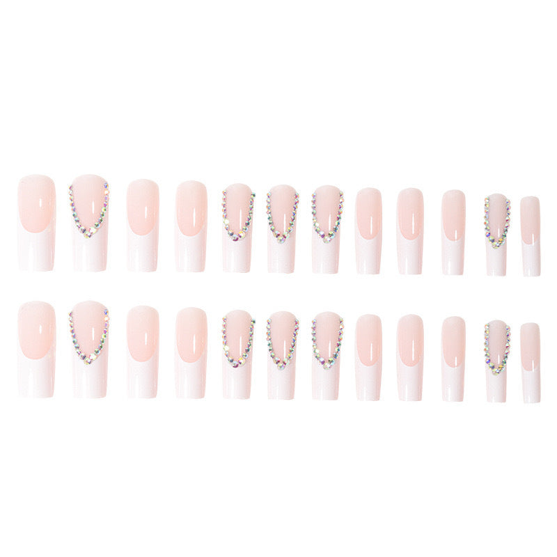 Artificial nail set with glamorous rhinestones and elegant tip decorations Stornfield