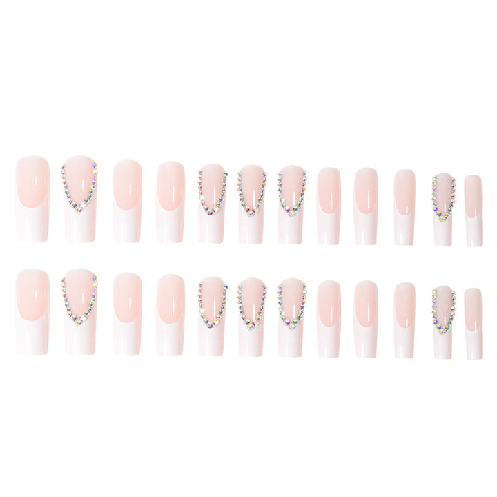 Artificial nail set with glamorous rhinestones and elegant tip decorations Stornfield