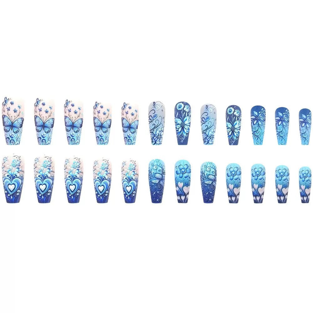 Artificial nail set with floral and butterfly patterns Stornfield