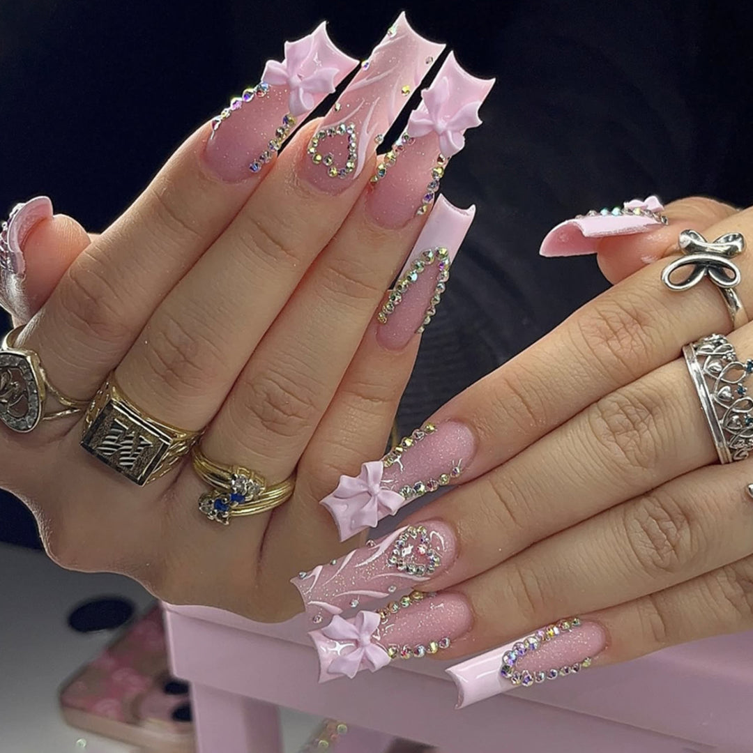 Artful stiletto nails with glitter accents Stornfield