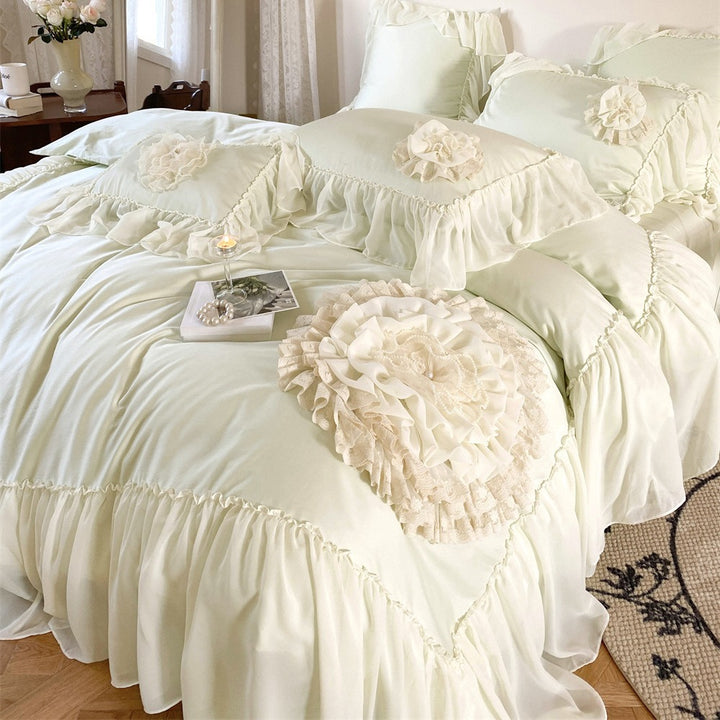 Romantic bedding set with chiffon ruffles and 3D flower appliqués
