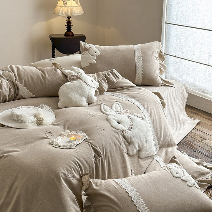 Children's bedding set with three-dimensional bunny applique, ruffle and linen look