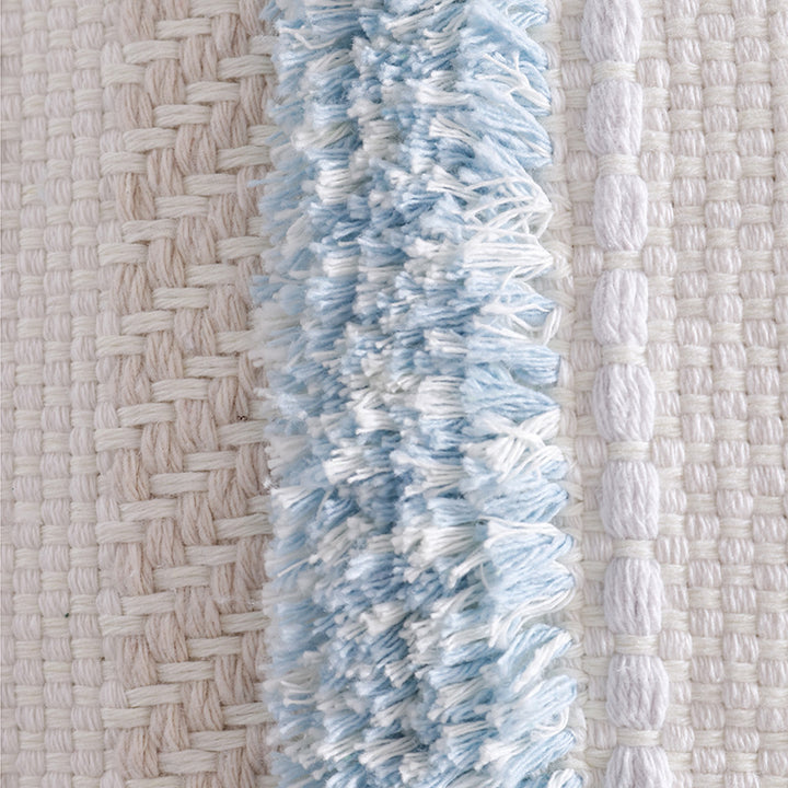 Structured living room carpet with 3D tufting and geometric diamond relief