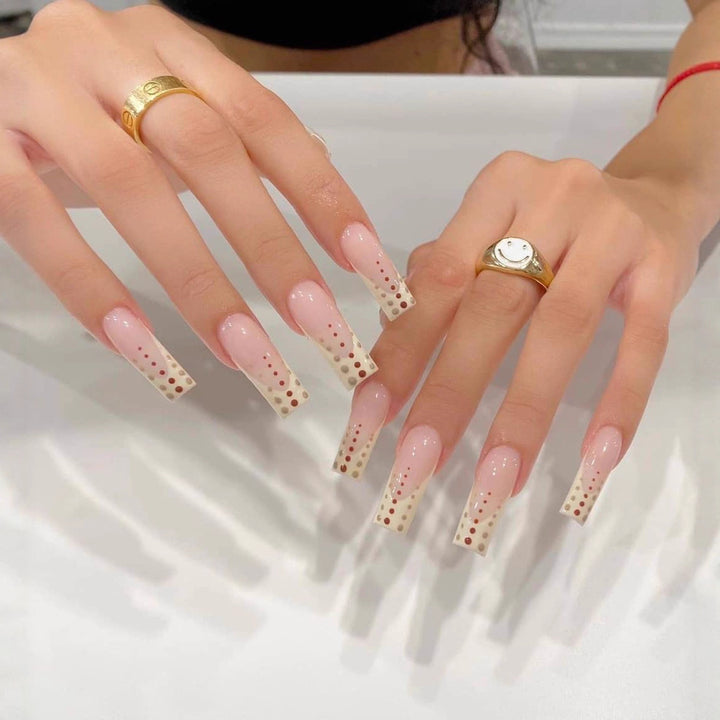Artistic Nail Extensions with Elegant Dots and Shimmering Ombré Stornfield
