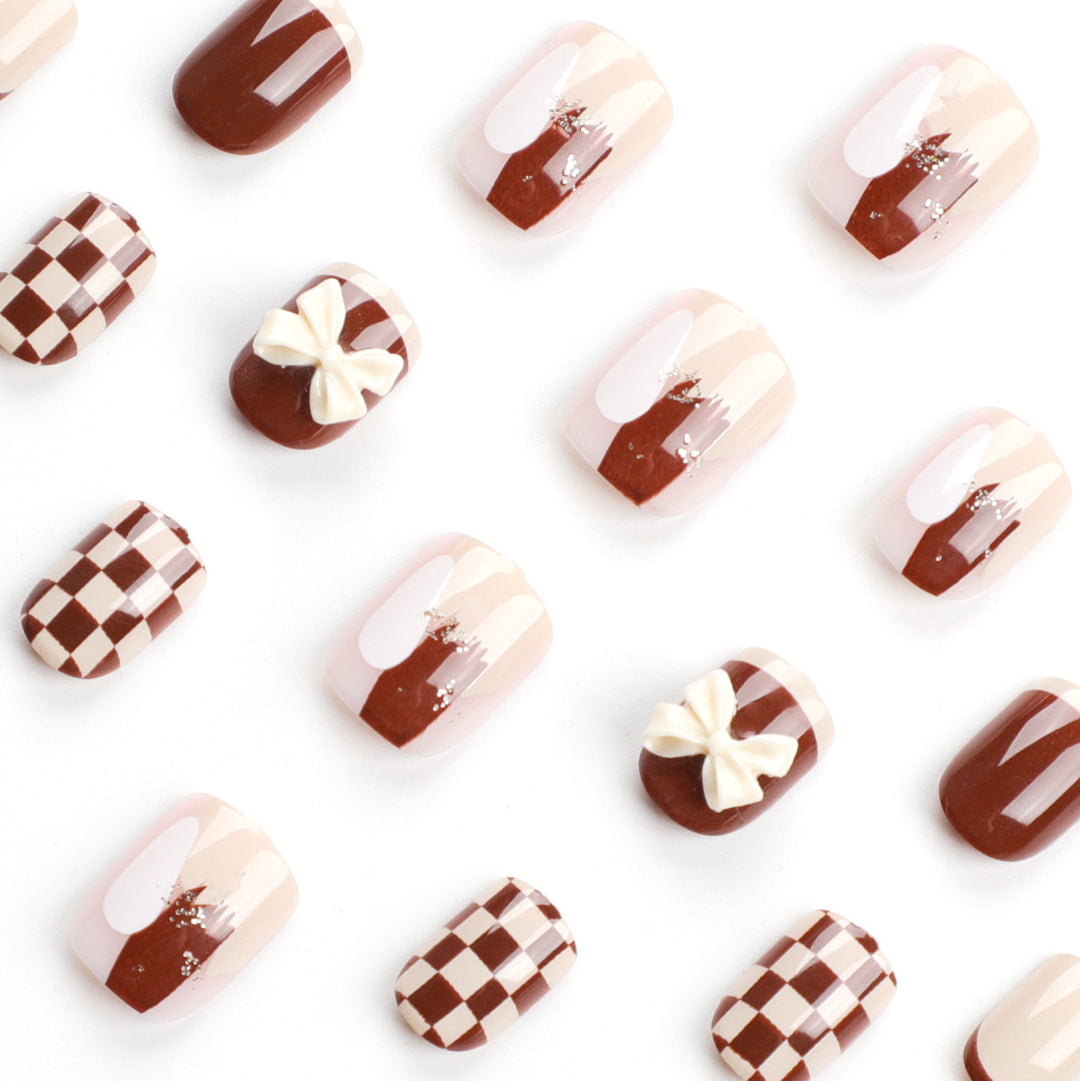 Creative Nail Art with Modern Patterns and Bow Motifs Stornfield