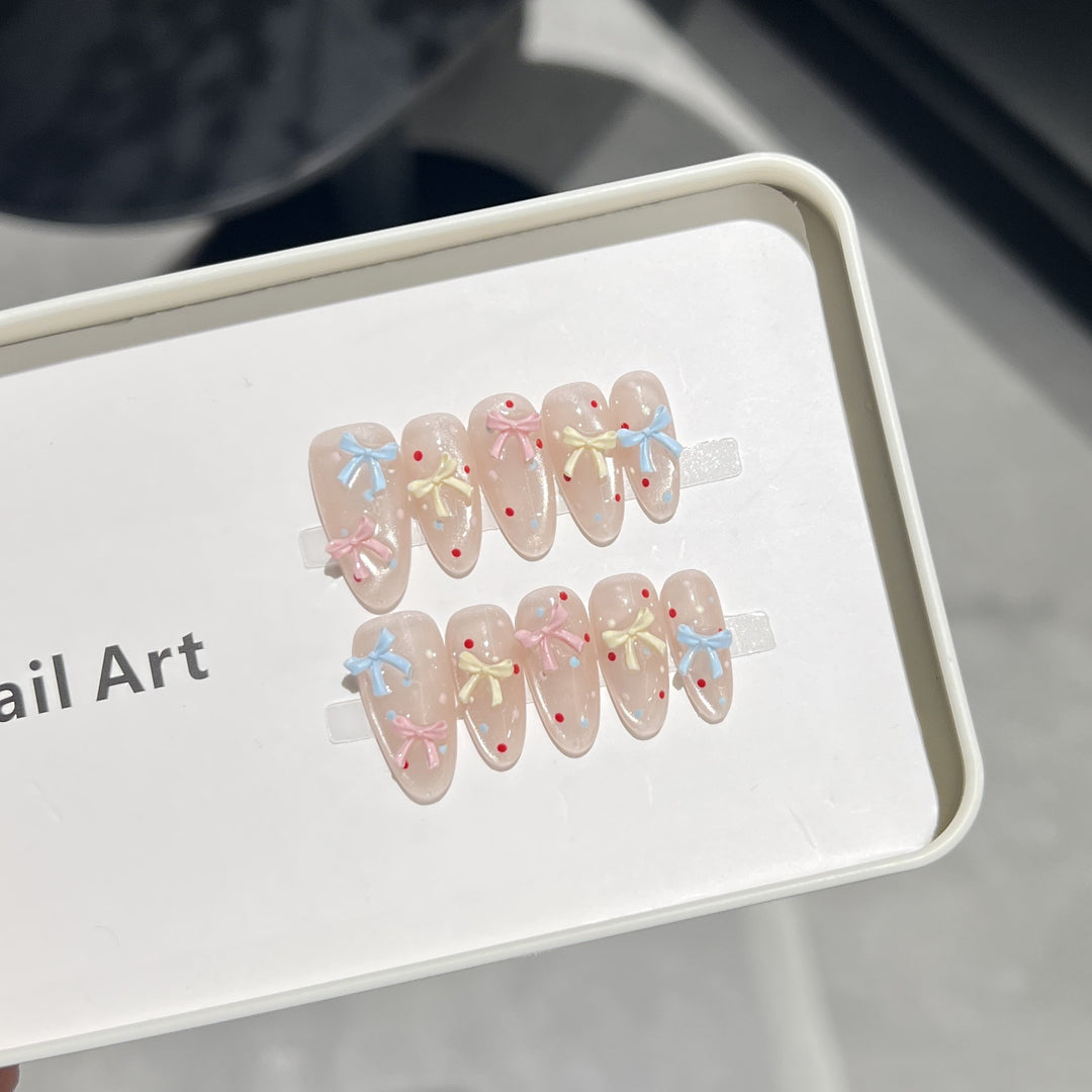 Decorative Press-On Nail Set with Charming Bow and Dots Stornfield