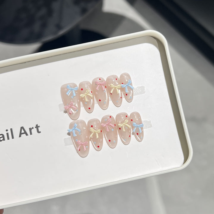 Decorative Press-On Nail Set with Charming Bow and Dots Stornfield